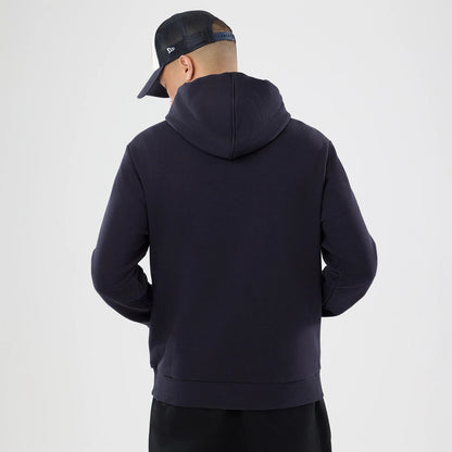 The model is wearing this NFL International Series Games 2026 Houston Texans Pullover Hoodie in navy. 2