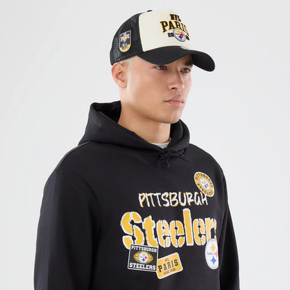The model is wearing this NFL International Series Games 2026 Pittsburgh Steelers Pullover Hoodie in black. 6