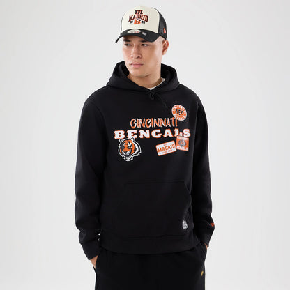 The model is wearing this NFL International Series Games 2026 Cincinnati Bengals Pullover Hoodie in black. 1