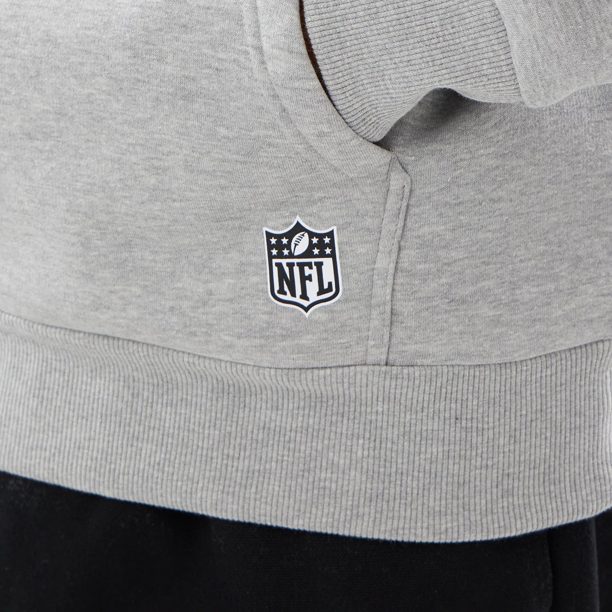 The model is wearing this NFL International Series Games 2026 New England Patriots Pullover Hoodie in grey. 4