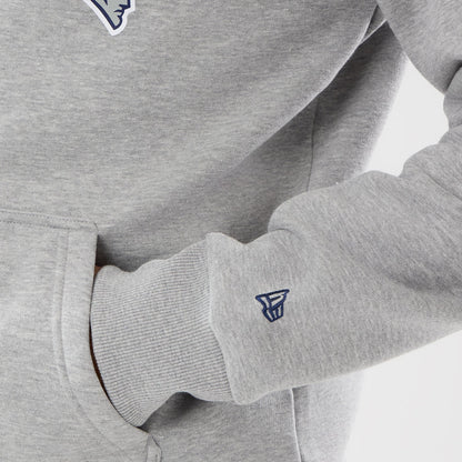 The model is wearing this NFL International Series Games 2026 New England Patriots Pullover Hoodie in grey. 5