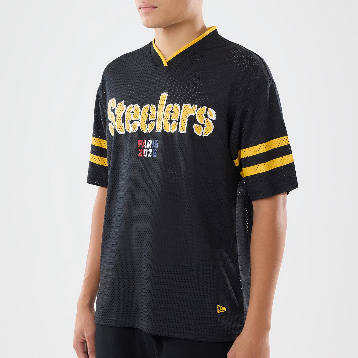 The model is wearing this NFL International Series Games 2026 Pittsburgh Steelers Mesh Jersey in black. 3