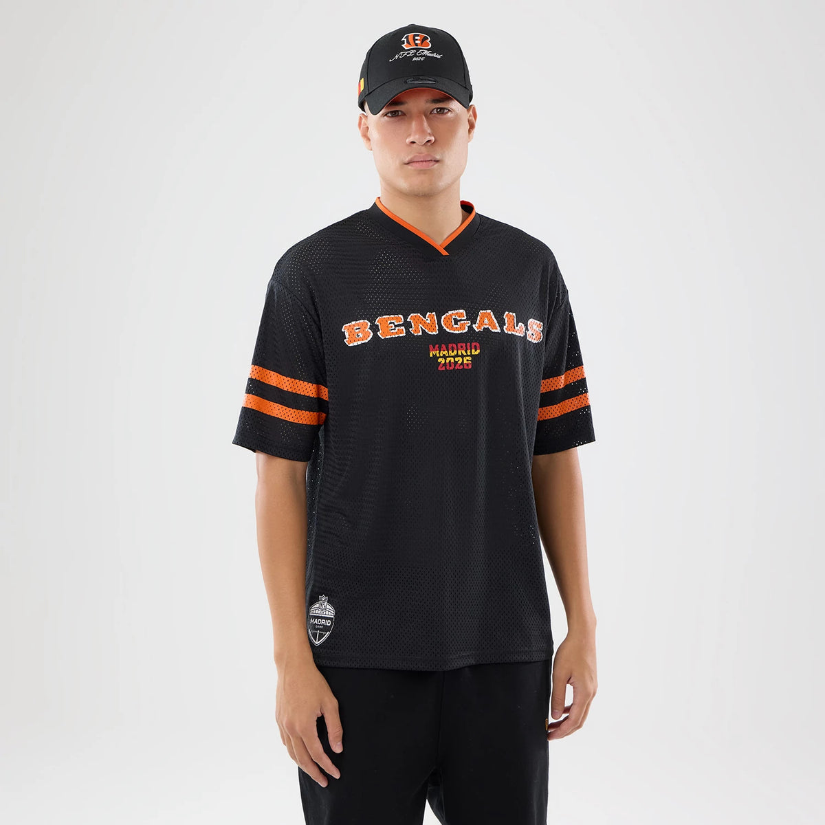 The model is wearing this NFL International Series Games 2026 Cincinnati Bengals Mesh Jersey in black. 1