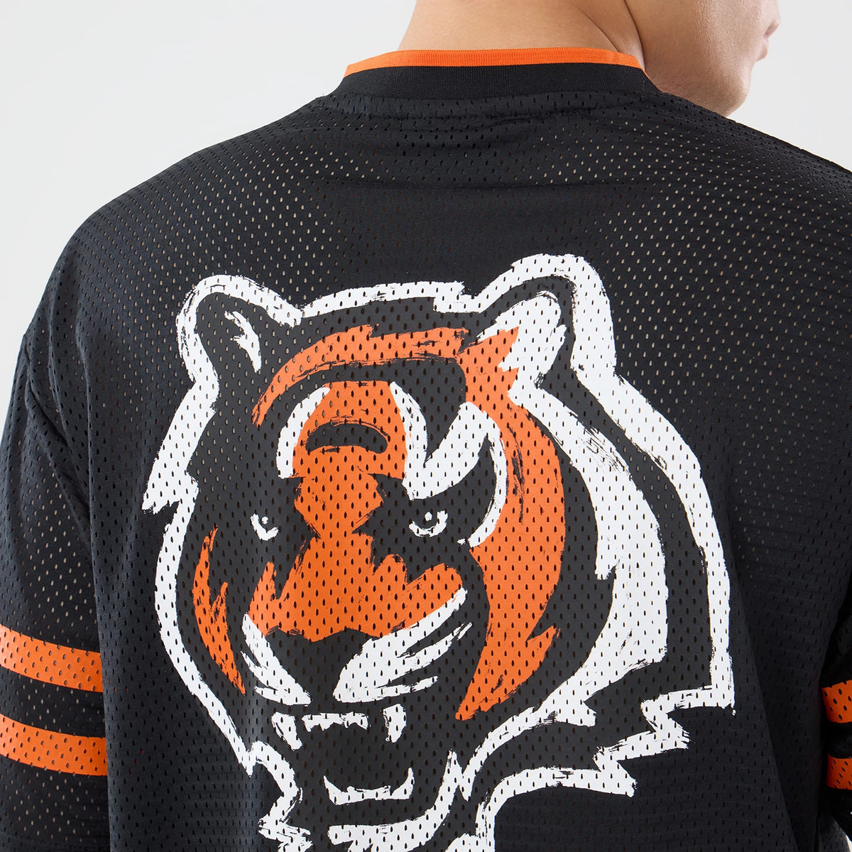 The model is wearing this NFL International Series Games 2026 Cincinnati Bengals Mesh Jersey in black. 7