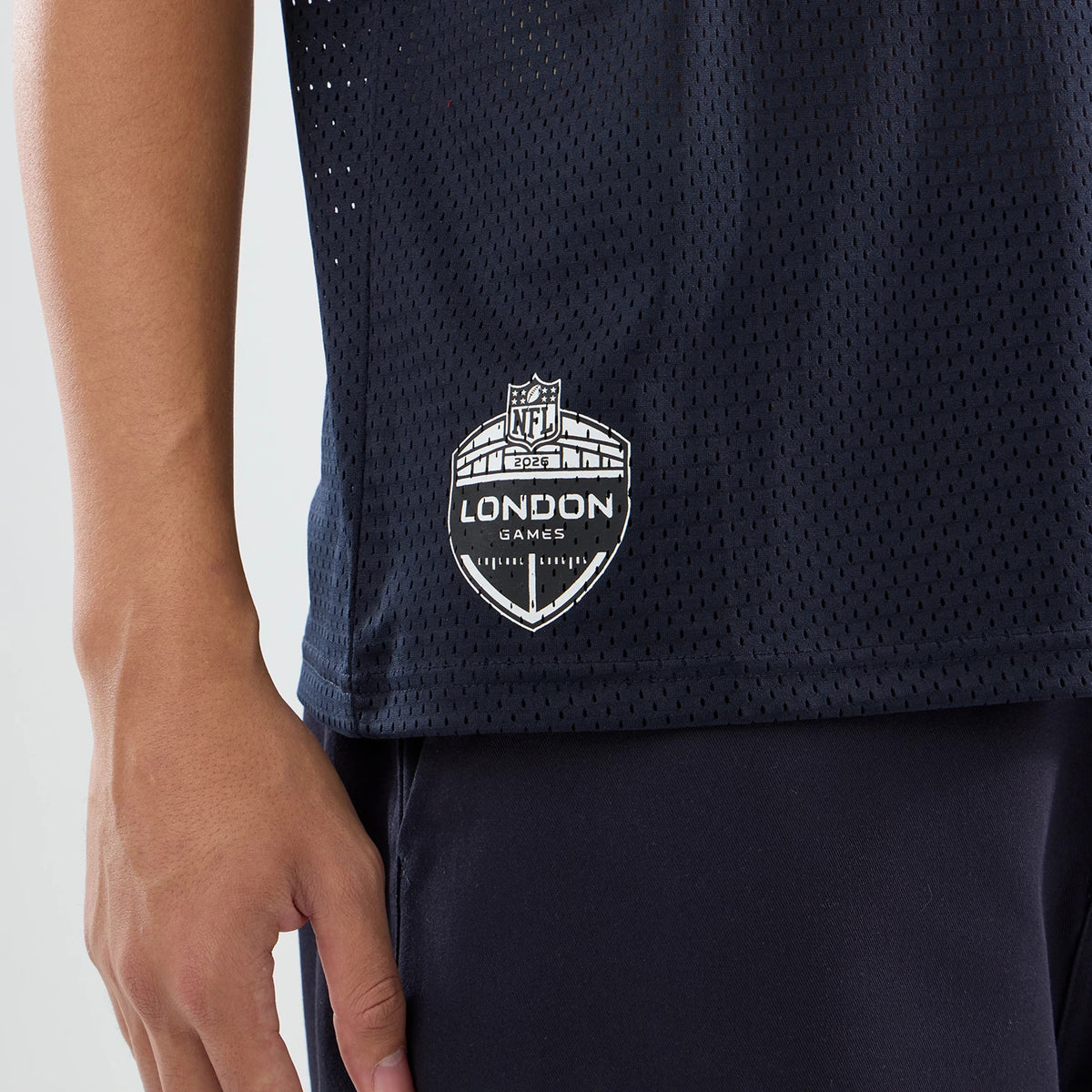 The model is wearing this NFL International Series Games 2026 Houston Texans Mesh Jersey in navy. 4
