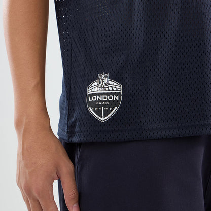 The model is wearing this NFL International Series Games 2026 Houston Texans Mesh Jersey in navy. 4