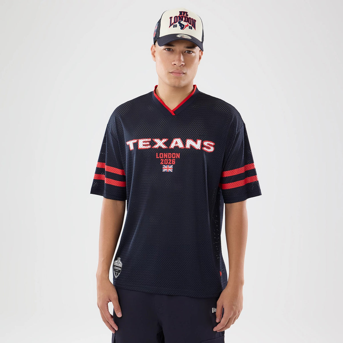 The model is wearing this NFL International Series Games 2026 Houston Texans Mesh Jersey in navy. 1