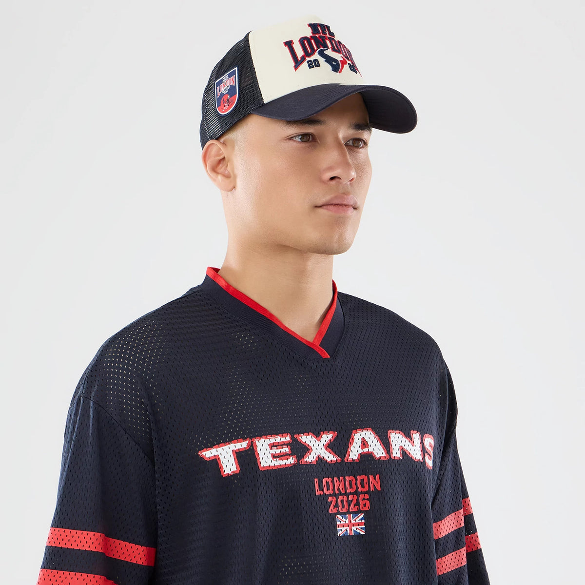 The model is wearing this NFL International Series Games 2026 Houston Texans Mesh Jersey in navy. 6