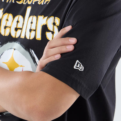 The model is wearing this NFL International Series Games 2026 Pittsburgh Steelers Oversized T-Shirt in black. 5