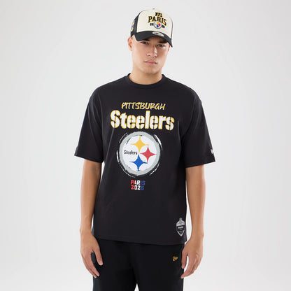 The model is wearing this NFL International Series Games 2026 Pittsburgh Steelers Oversized T-Shirt in black. 1