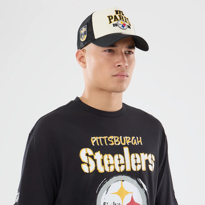 The model is wearing this NFL International Series Games 2026 Pittsburgh Steelers Oversized T-Shirt in black. 6