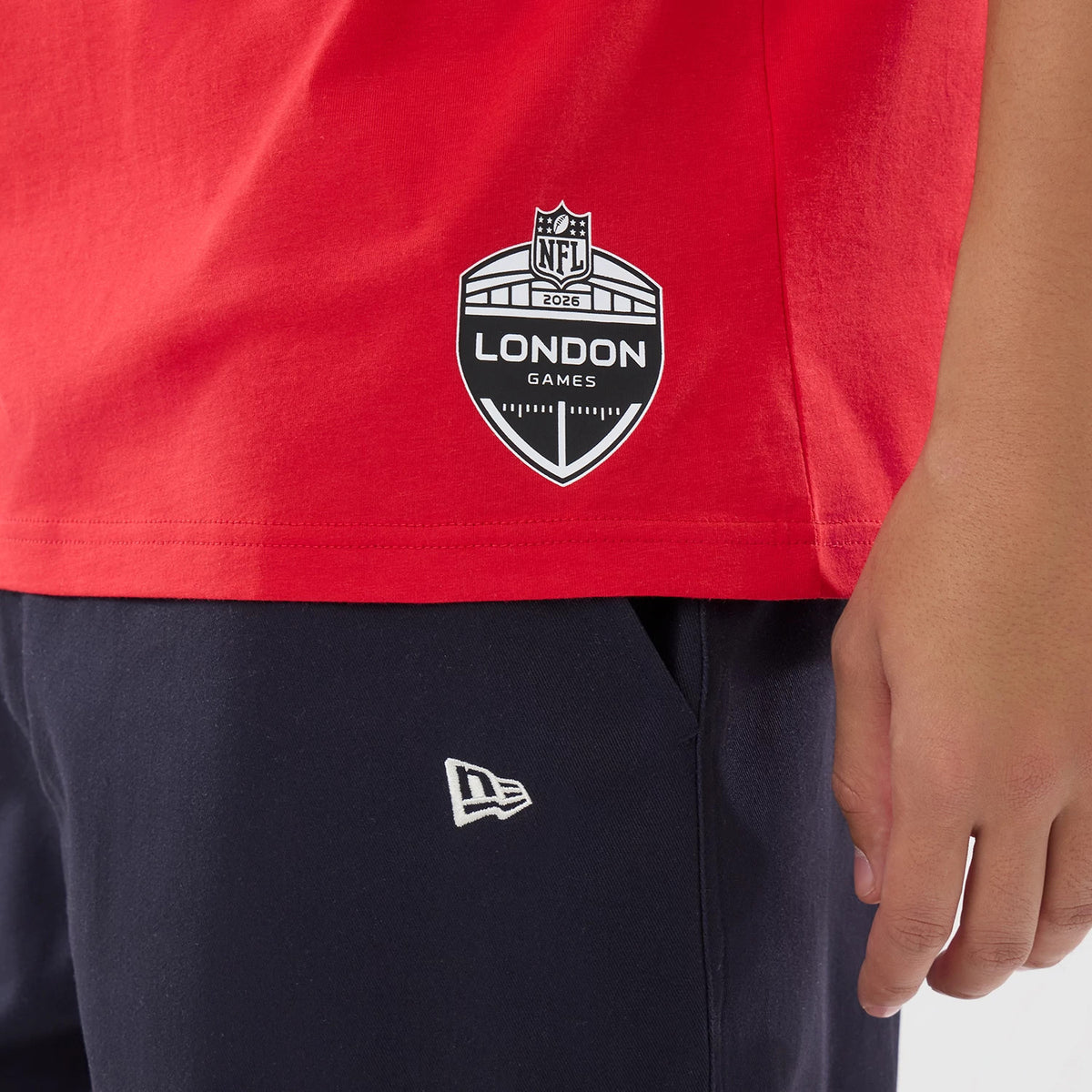 The model is wearing this NFL International Series Games 2026 Houston Texans Oversized T-Shirt in red. 7