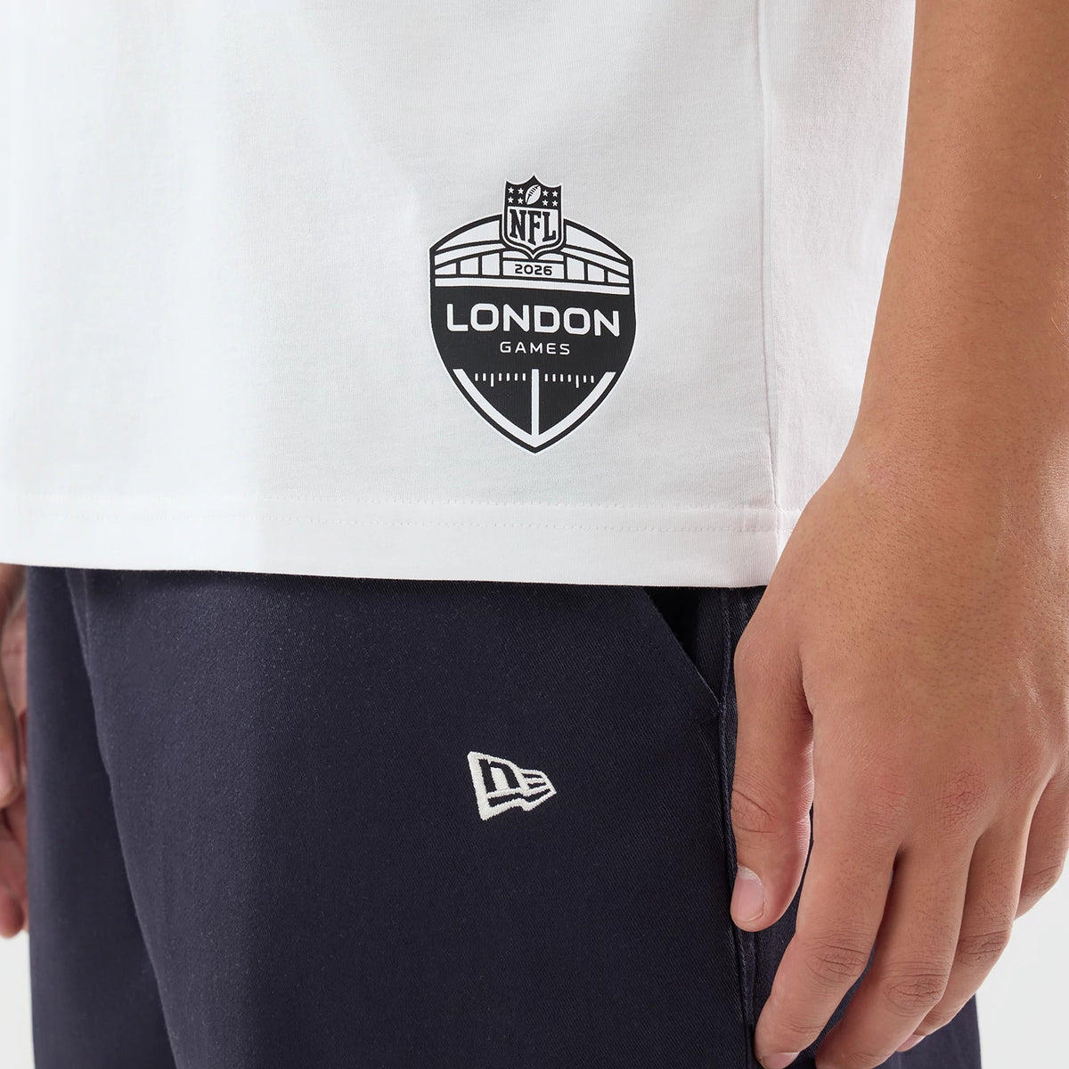 The model is wearing this NFL International Series Games 2026 Indianapolis Colts Oversized T-Shirt in white. 7