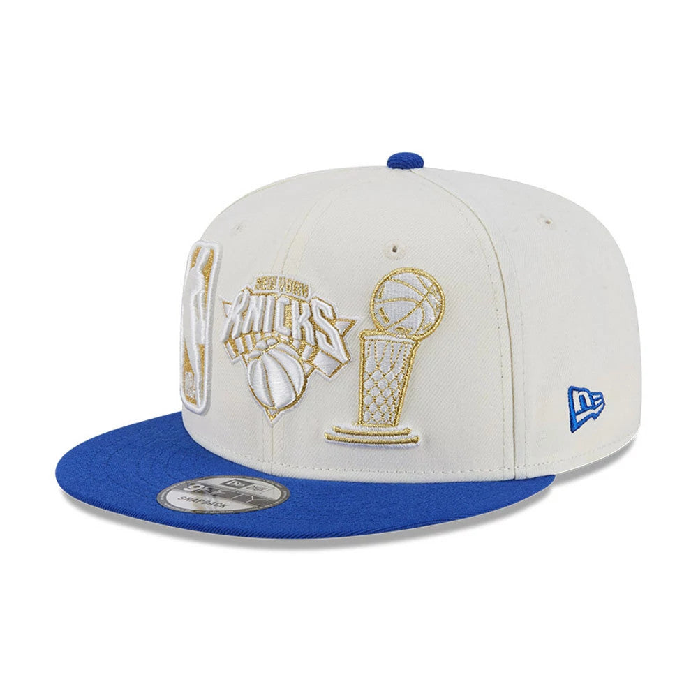 Pictured is this NBA '26 Ring Off New York Knicks 9FIFTY Snapback cap in blue. 4