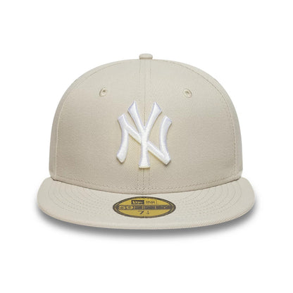 Pictured is this MLB New York Yankees 59FIFTY Fitted cap in light beige. 3