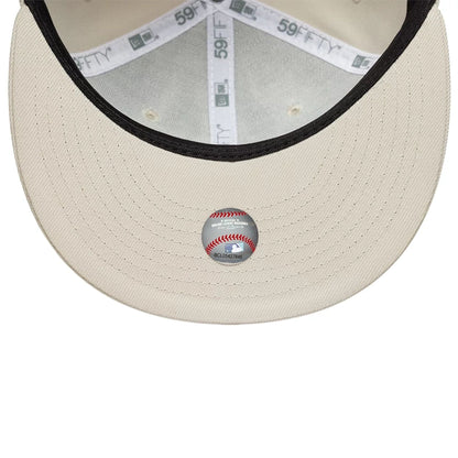 Pictured is this MLB New York Yankees 59FIFTY Fitted cap in beige. 2