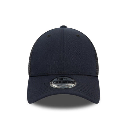 New Era Blank Navy 9FORTY Trucker Cap, front view showing a curved navy visor with a 9FORTY size sticker and mesh side panels, featuring a structured front panel without any logo or embroidery.