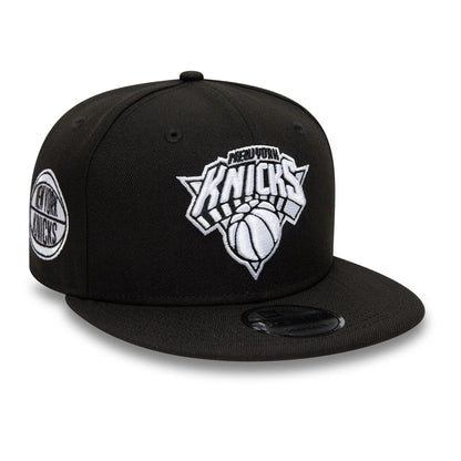 Pictured is this New York Knicks NBA Black 9FIFTY Snapback Adjustable cap. 1
