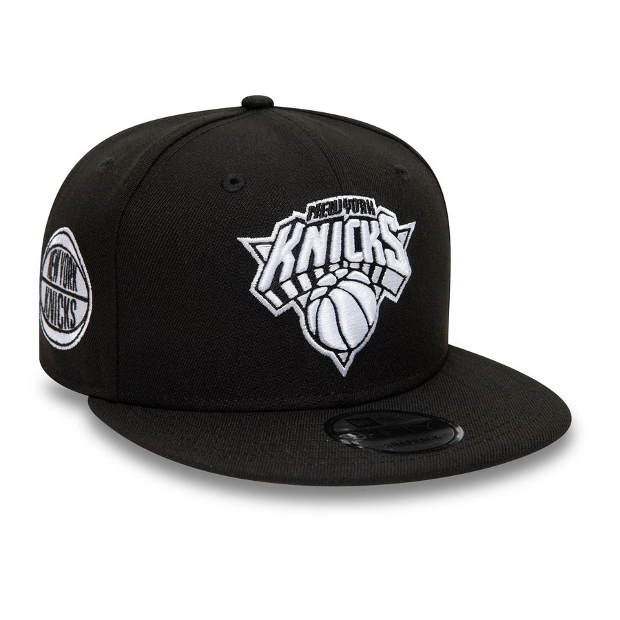 Pictured is this New York Knicks NBA Black 9FIFTY Snapback Adjustable cap. 1