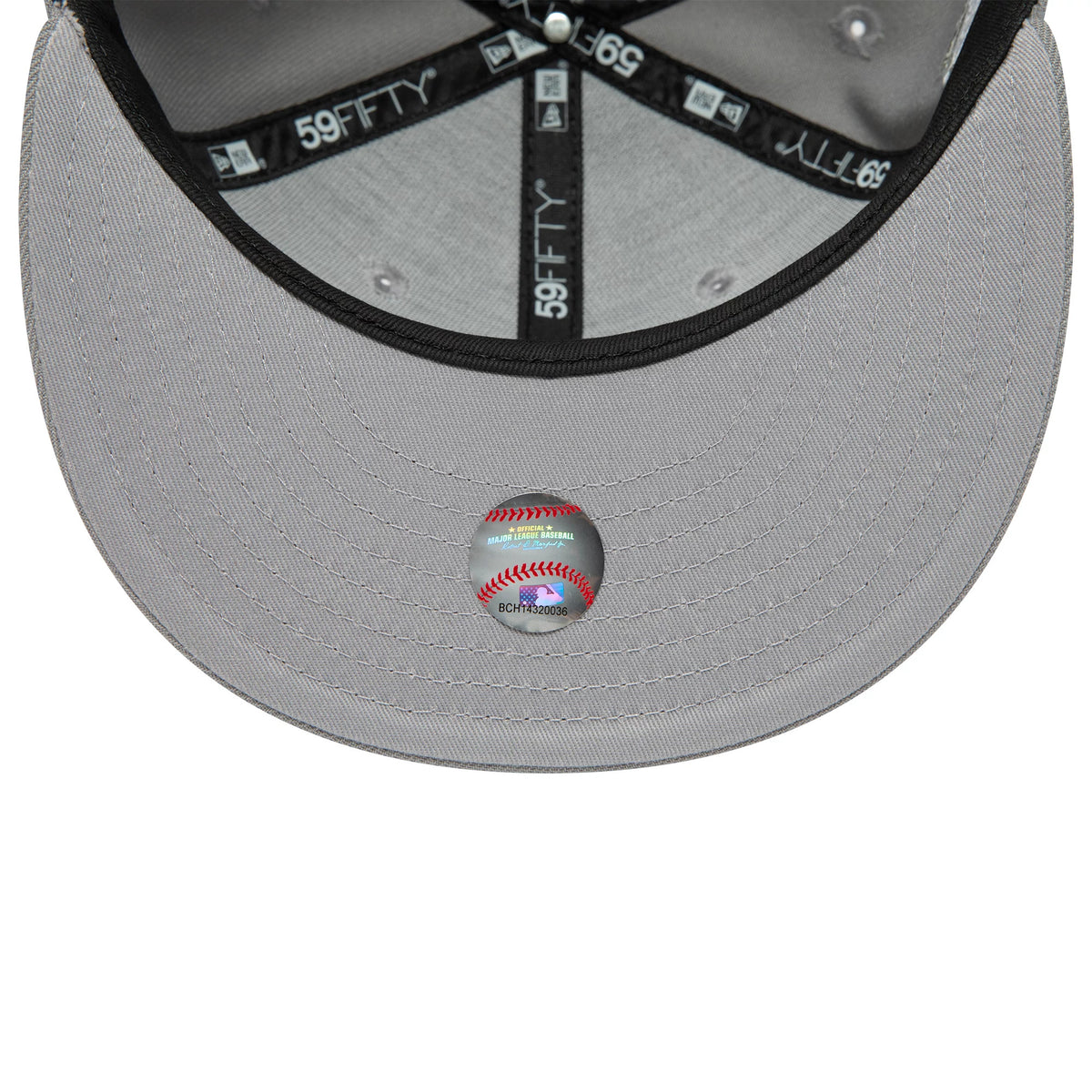 Chicago White Sox Essential Pack Grey New Era 59FIFTY Fitted Cap, inside view showing the black branded taping and sweatband, with a grey undervisor that has a baseball graphic sticker at the centre.