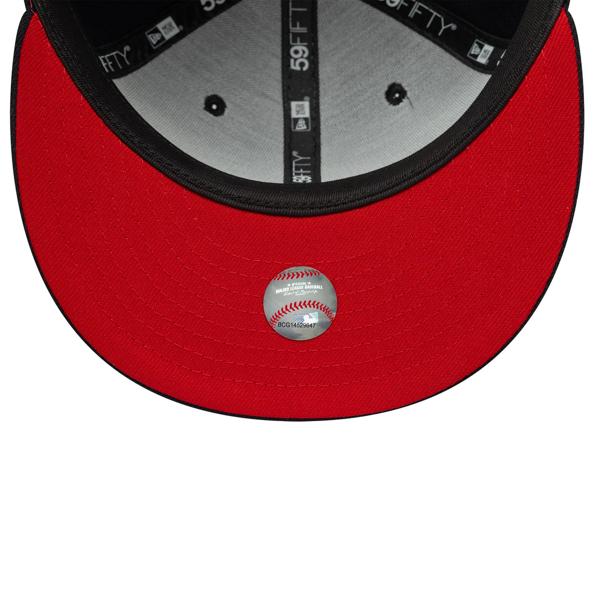 Boston Red Sox MLB Cooperstown Navy New Era 59FIFTY Fitted Cap, inside view showing a red undervisor with a baseball graphic sticker, black taping with repeating 59FIFTY branding, and a grey sweatband for added comfort.