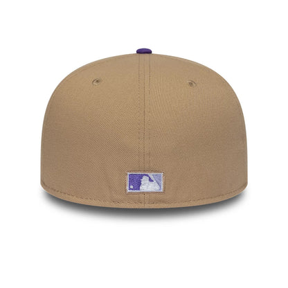 Houston Astros MLB Cooperstown Beige New Era 59FIFTY Fitted Cap, rear view showing the purple and white MLB Batterman logo centred on the back panels, beneath a top button in contrasting purple, on a beige structured crown.