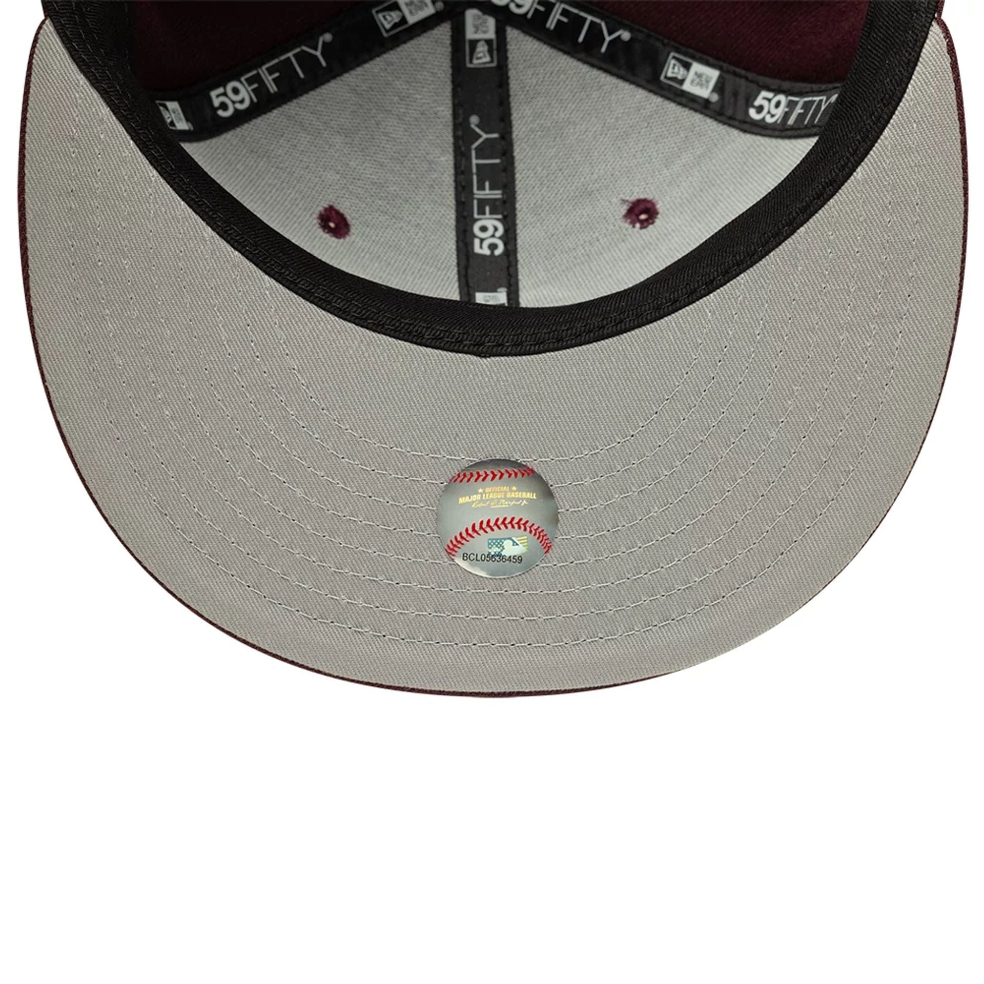 Pictured is this MLB Athletics 59FIFTY Fitted cap in dark purple. 2