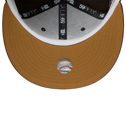 Pictured is this MLB Cooperstown Seattle Mariners 59FIFTY Fitted cap in dark brown. 2