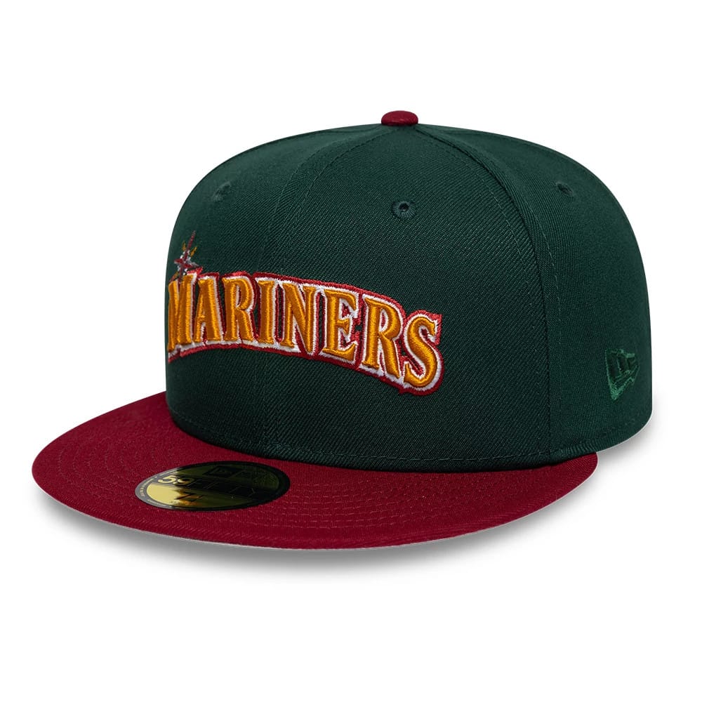 Pictured is this MLB Cooperstown Seattle Mariners 59FIFTY Fitted cap in dark green. 4