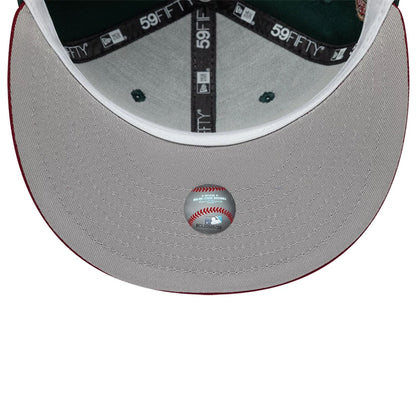Pictured is this MLB Cooperstown Seattle Mariners 59FIFTY Fitted cap in dark green. 2