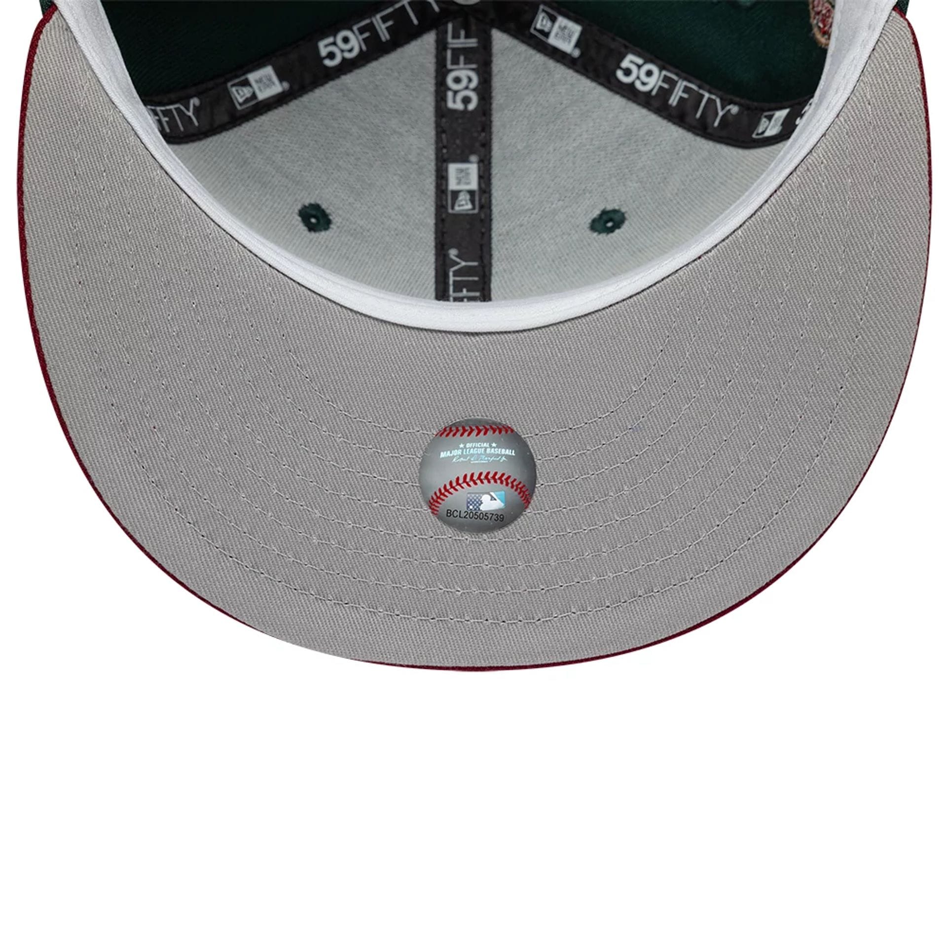 Pictured is this MLB Cooperstown Seattle Mariners 59FIFTY Fitted cap in dark green. 2