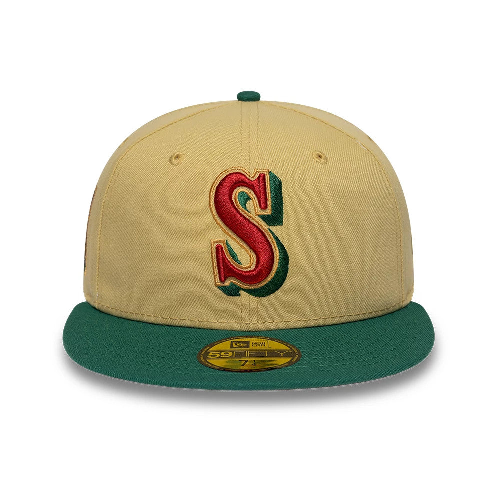 Pictured is this MLB Vegas Seattle Mariners 59FIFTY Fitted cap in gold. 3