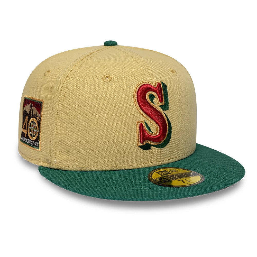 Pictured is this MLB Vegas Seattle Mariners 59FIFTY Fitted cap in gold. 1
