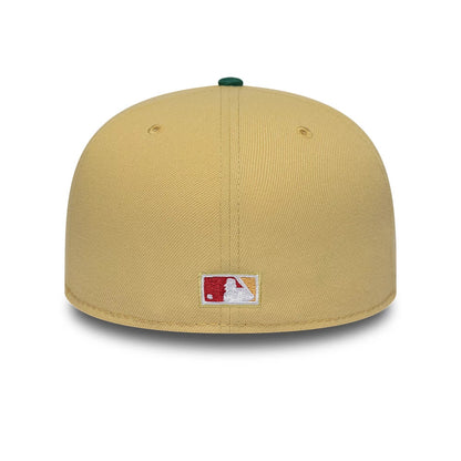 Pictured is this MLB Vegas Seattle Mariners 59FIFTY Fitted cap in gold. 7