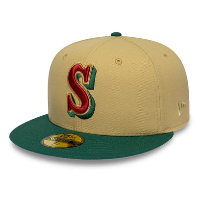 Pictured is this MLB Vegas Seattle Mariners 59FIFTY Fitted cap in gold. 4