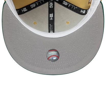 Pictured is this MLB Vegas Seattle Mariners 59FIFTY Fitted cap in gold. 2