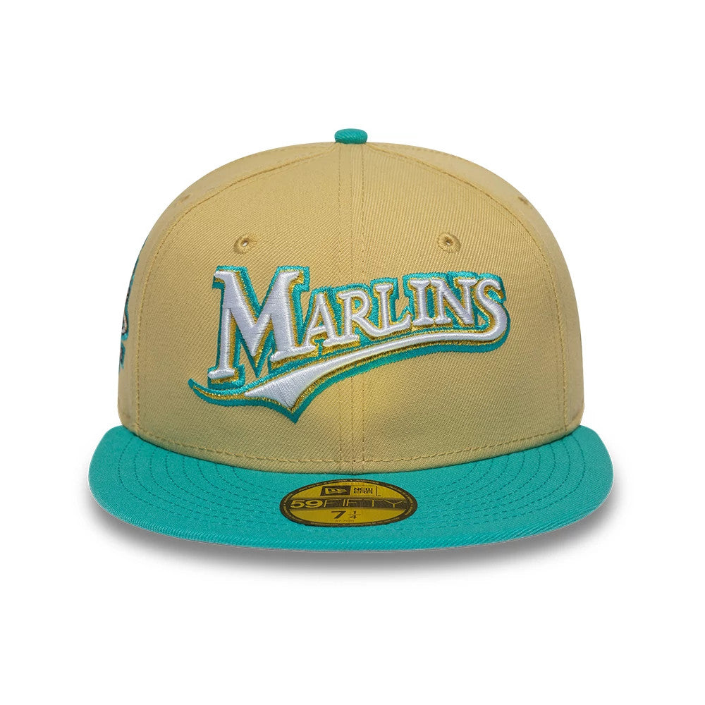 Pictured is this MLB Vegas Gold Florida Marlins 59FIFTY Fitted cap in gold & black. 3