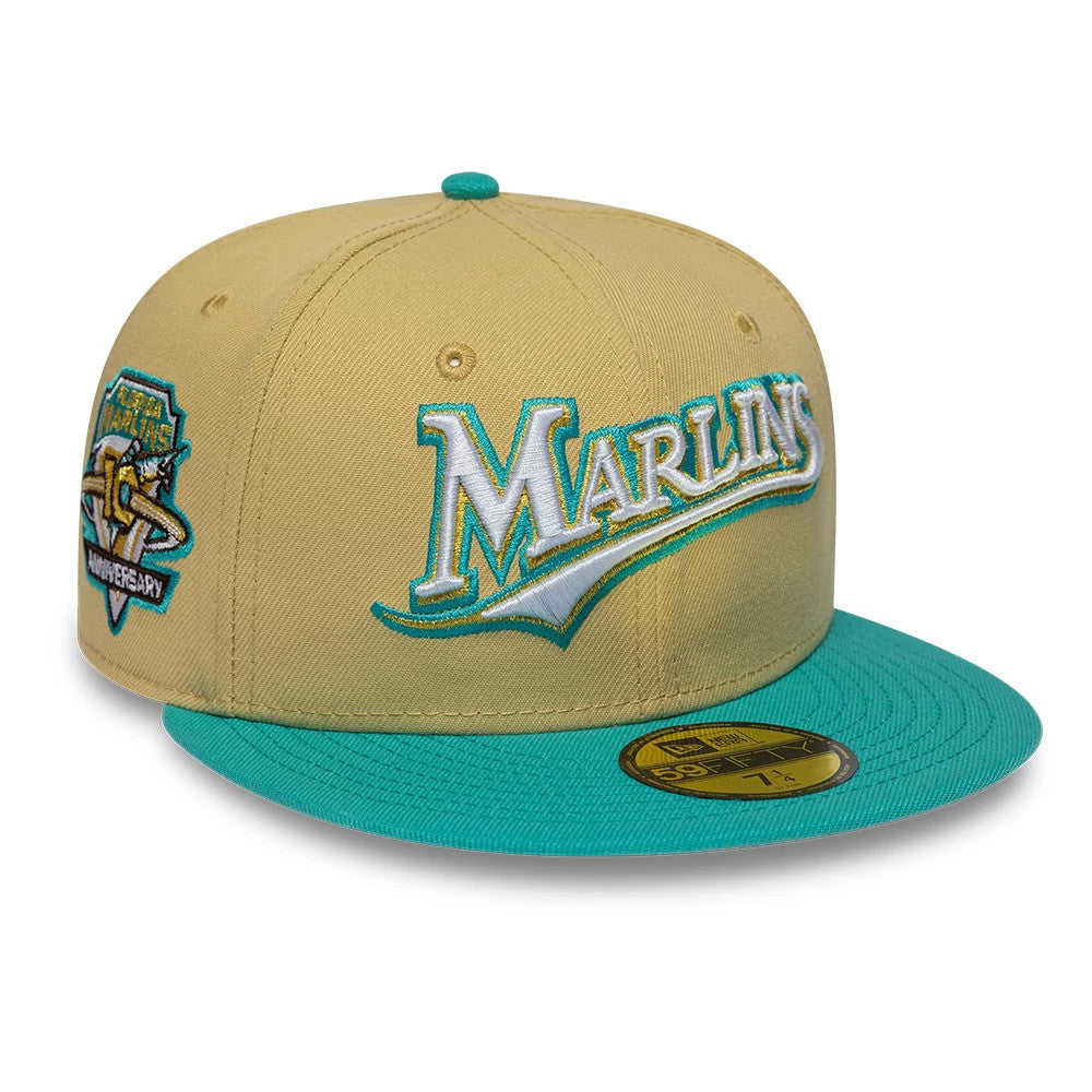 Pictured is this MLB Vegas Gold Florida Marlins 59FIFTY Fitted cap in gold & black. 1