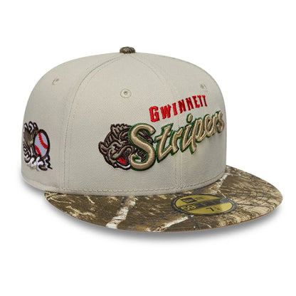 Pictured is this MiLB Hometown Gwinnett Stripers 59FIFTY Fitted cap in Beige. 1