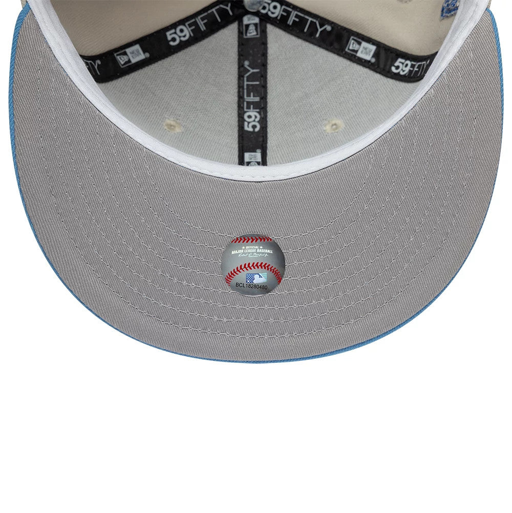 Pictured is this MLB Cooperstown Houston Astros 59FIFTY Fitted cap in beige & blue. 2