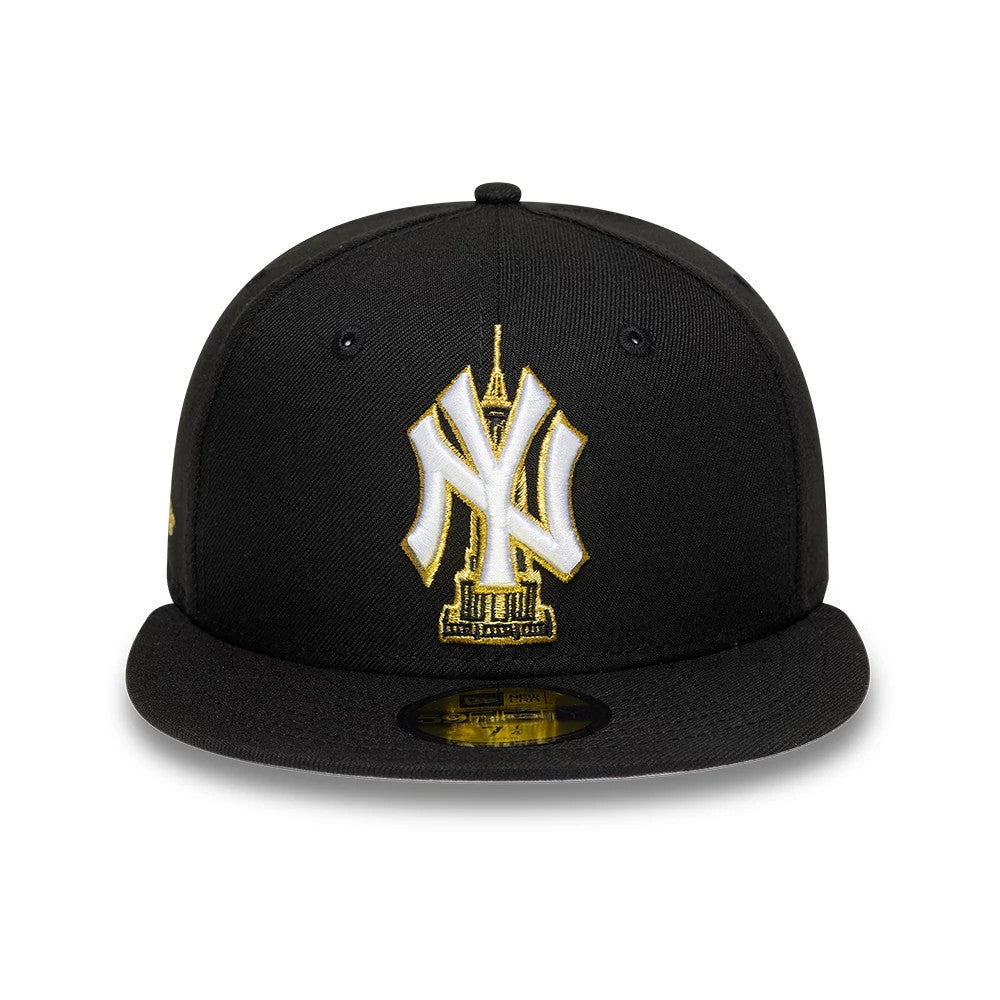 New York Yankees MLB Empire State Black New Era 59FIFTY Fitted Cap, front view showing the white and gold embroidered NY logo with the Empire State Building on the front panel, completed with a flat black visor and gold 59FIFTY size sticker.