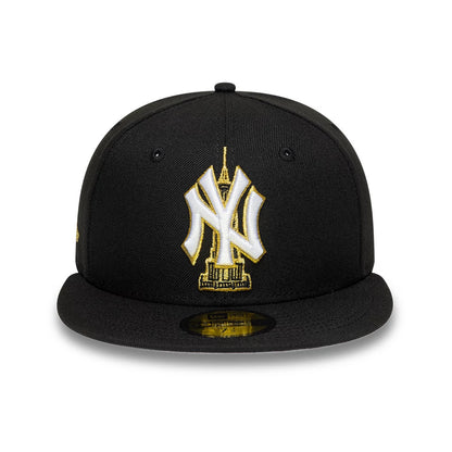 New York Yankees MLB Empire State Black New Era 59FIFTY Fitted Cap, front view showing the white and gold embroidered NY logo with the Empire State Building on the front panel, completed with a flat black visor and gold 59FIFTY size sticker.