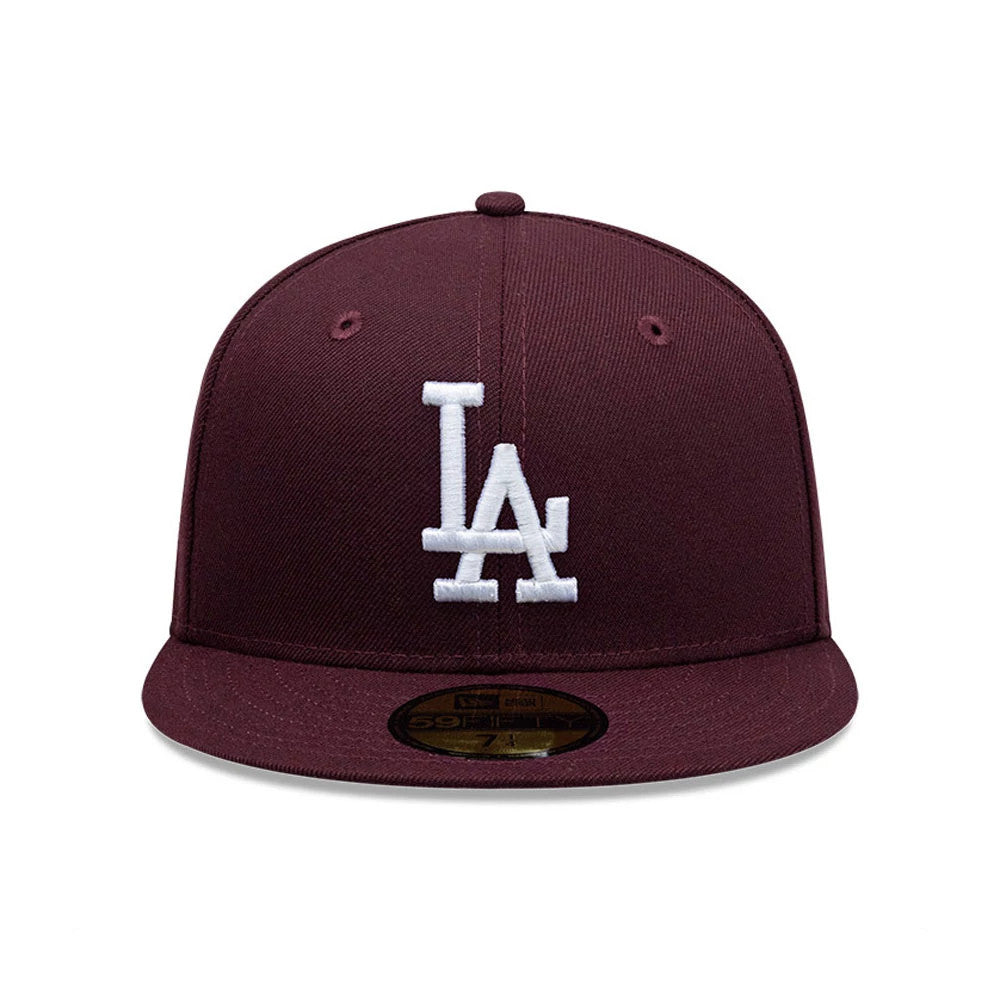 LA Dodgers MLB Dark Purple New Era 59FIFTY Fitted Cap, front view showing the raised white embroidered LA logo on the structured dark purple crown, with a matching flat visor and a gold 59FIFTY size sticker on the visor.