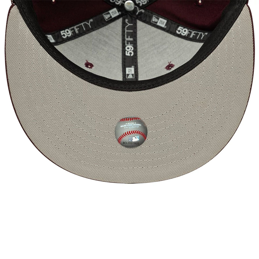 Pictured is this MLB Chicago White Sox 59FIFTY Fitted cap in dark purple. 2