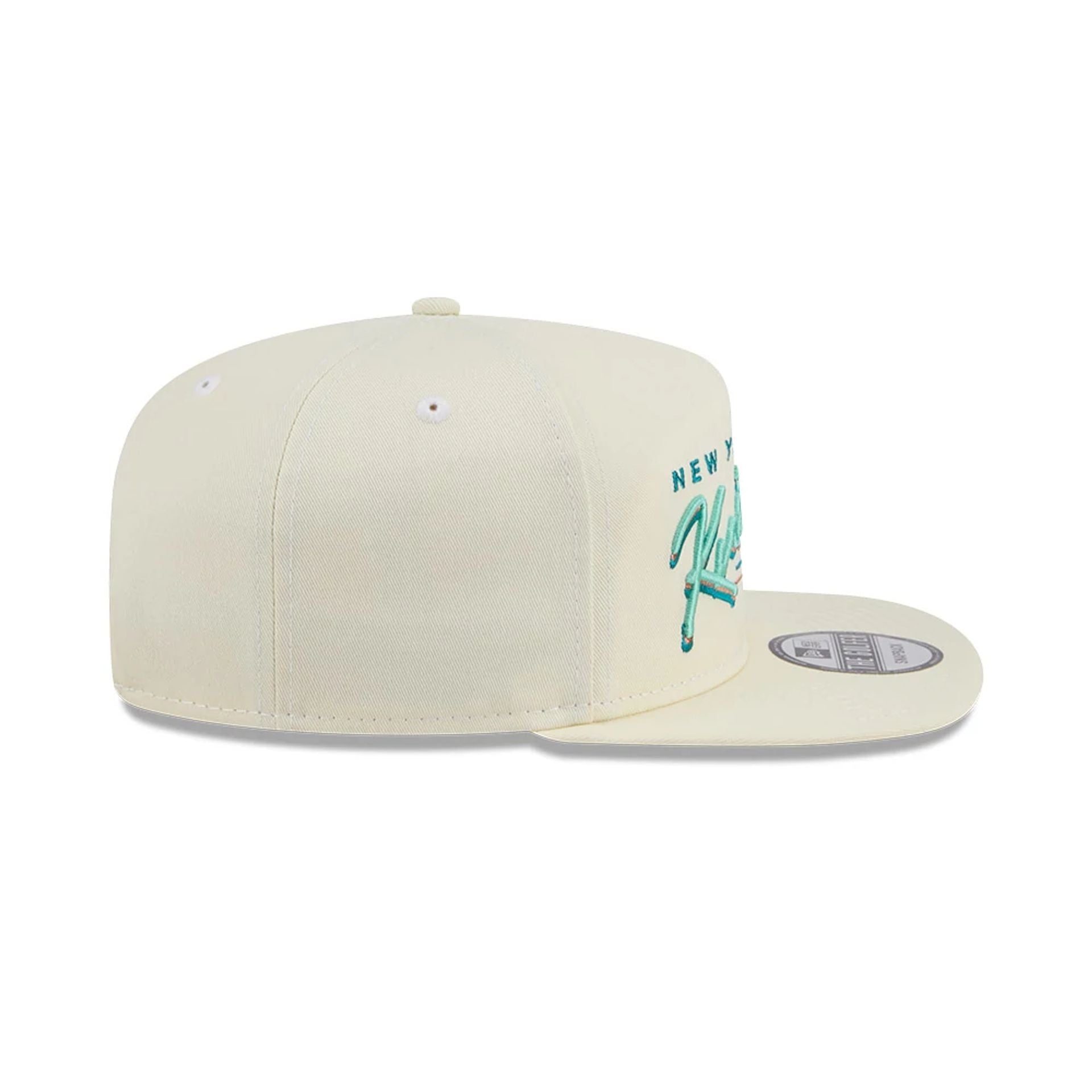 This is a New York Knicks NBA Cream Golfer Adjustable Cap 6