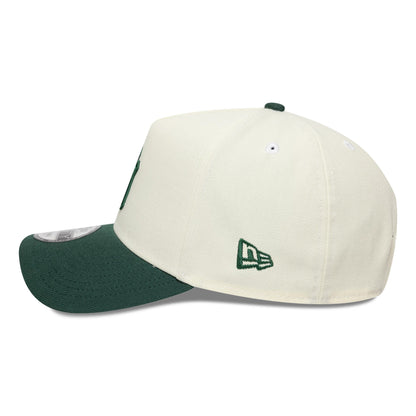 Pictured is this MLB World Series New York Yankees 9FORTY A-Frame cap in cream and dark green. 6