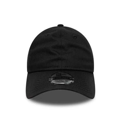 New Era Black 9TWENTY Adjustable Cap, front view showing the unstructured black crown with a curved visor and a 9TWENTY size sticker on the centre of the visor, with embroidered eyelets for ventilation.
