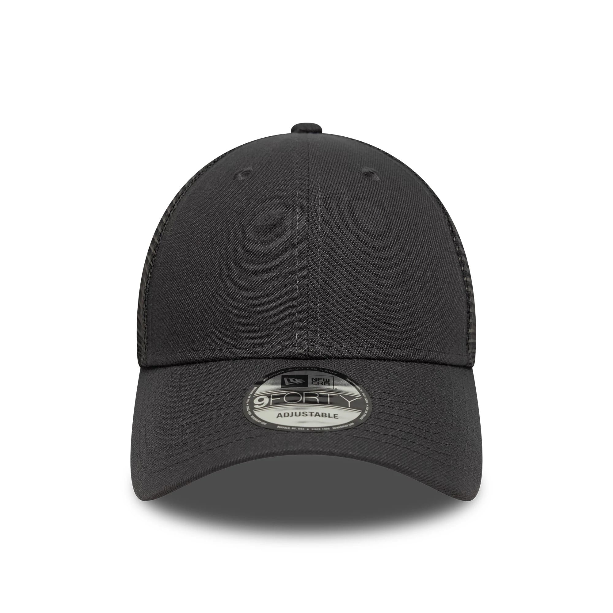 New Era Grey 9FORTY Trucker Adjustable Cap, front view showing a curved visor with a 9FORTY size sticker, structured crown with two eyelets, and mesh side panels for a classic trucker style look.