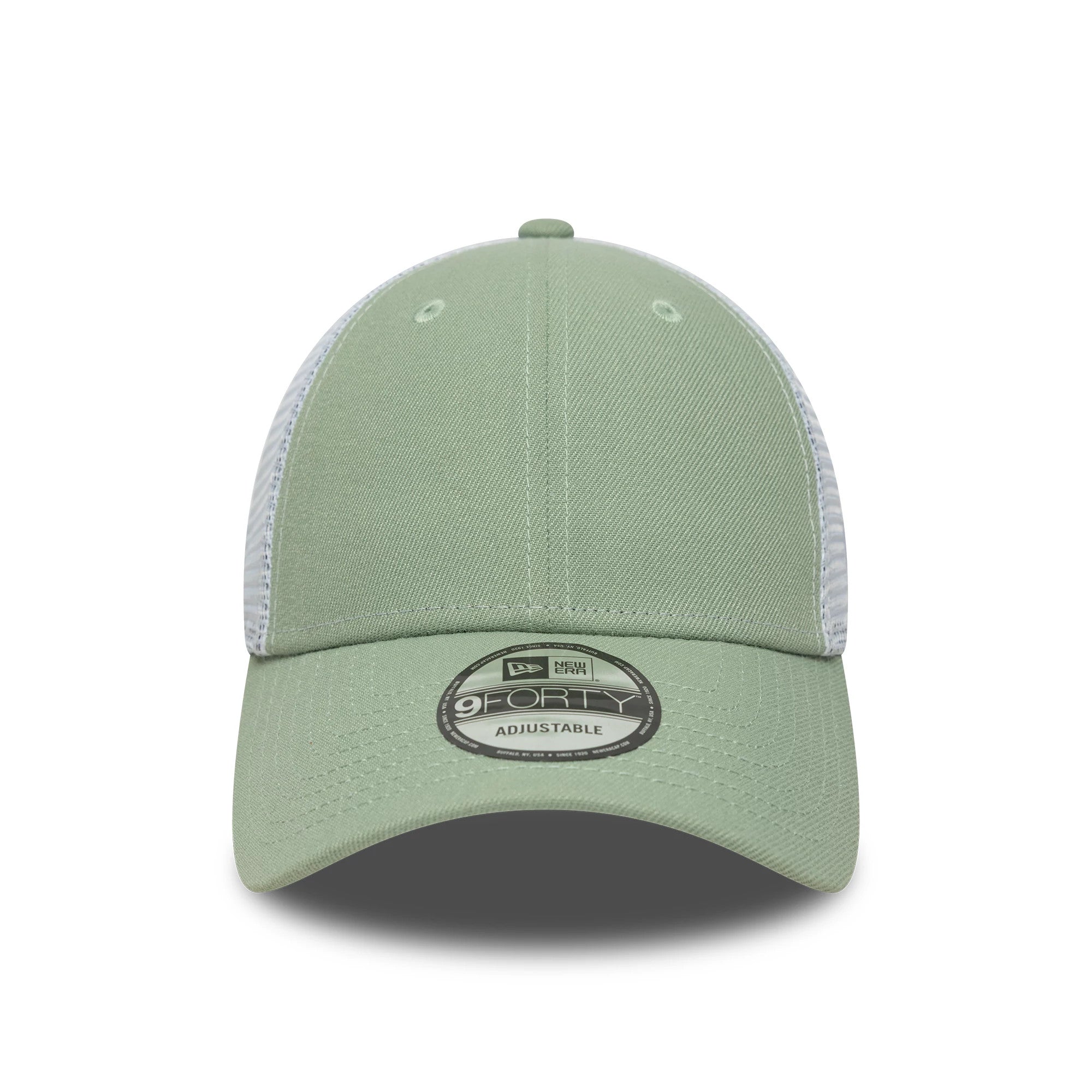 New Era Green 9FORTY Trucker Adjustable Cap, front view showing a structured green front panel with white mesh sides and a 9FORTY size sticker on the slightly curved green visor, featuring embroidered eyelets and a top button.