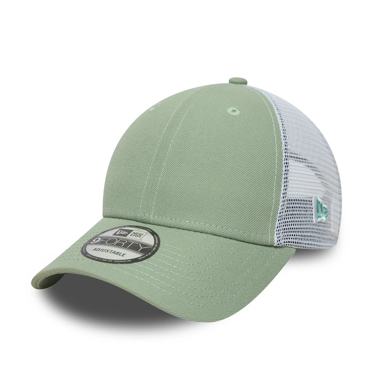 New Era Green 9FORTY Trucker Adjustable Cap, three-quarter view showing the black and white 9FORTY size sticker on the curved green visor, with a structured front panel, white mesh back panels, and an embroidered New Era flag logo on the left side.
